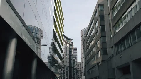 A narrow street between modern and old buildings. London. Stock Footage 88734533