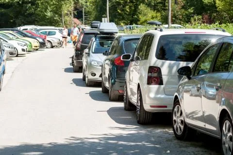Narrow street problems with parking traffic jam Stock Photos