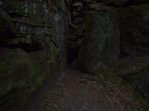 Narrow trail between two huge rock structures at Cuyahoga Valley National Park Stock Footage 82726838