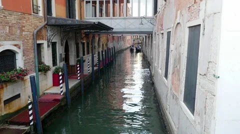 Narrow venice canal with gondolas in Venice, Italy Stock Footage 68546053