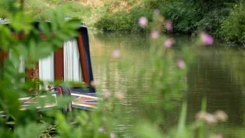 Narrowboat moored on canal Stock Footage 79407404
