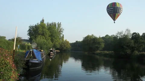 NarrowBoat On River with Balloon Flight over head Stock Footage 43182747
