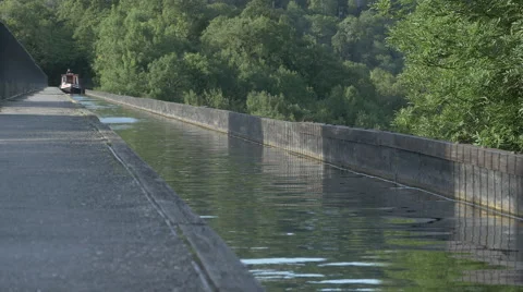 Narrowboat on Treetop Canal Stock Footage 59189838
