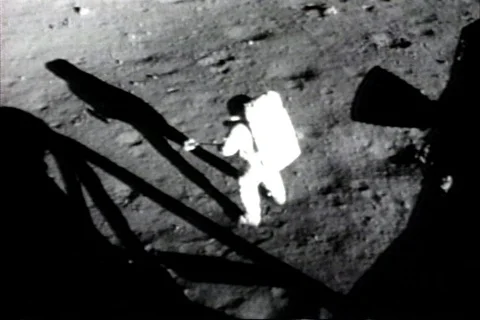 NASA - Apollo 11 Astronaut Neil Armstrong collects moon soil samples 1969 Stock Footage