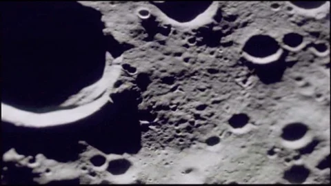 NASA Apollo Moon Missions - Flyover craters of the moon Stock Footage
