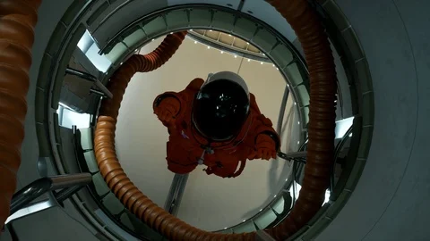 NASA astronaut moves into space station in zero gravity 03 Stock Footage