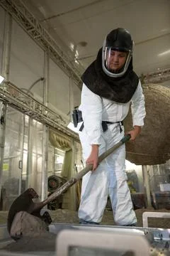NASA engineer Evan Bell prepares a vacuum chamber for testing 3D Fotos de archivo
