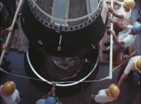 NASA engineers assembling capsule for Big Joe using hoist Stock Footage 262445000