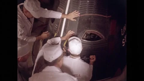 NASA engineers locking doors of space capsule Stock Footage 263445535