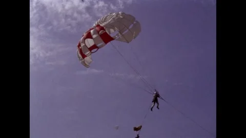 NASA Gemini Program astronauts conduct in parachute training Stock Footage 263418779