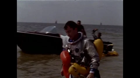 NASA Gemini Program astronauts take part in water survival training Stock Footage 263418780