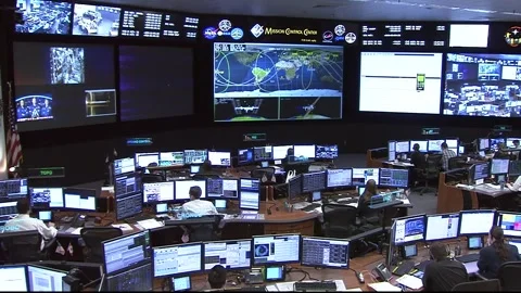 NASA mission control during Russian Soyuz MS-11 spacecraft launch Stock Footage 273697458