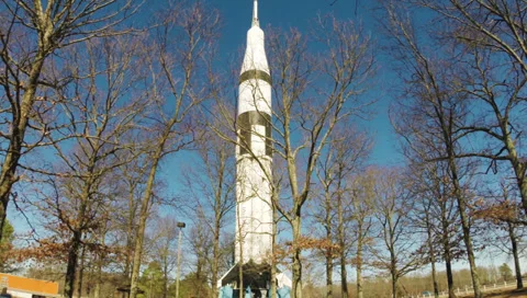 NASA Rocket Behind Bare Trees 2.7K Video stock 35752007