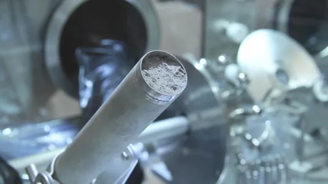 NASA scientist studying moon samples collected by Apollo 17 lunar landing Video stock 265579742