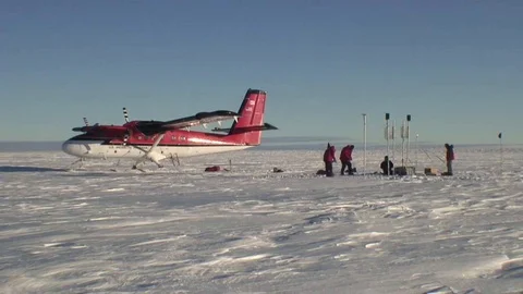 NASA scientists take ice core samples in Antarctica to study global warming. Video stock 123366580