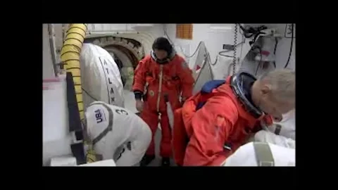 NASA Space Shuttle Atlantis astronaut ission Specialist Piers Sellers suiting up Stock Footage 283460544