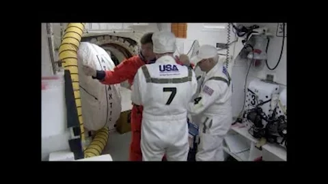 NASA Space Shuttle Atlantis astronaut Mission Specialist Steve Bowen suiting up Stock Footage 283460559
