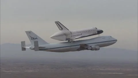 NASA Space Shuttle Atlantis ferry flight to Kennedy Space Center atop Boeing 737 Stock Footage 283627389