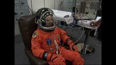 NASA Space Shuttle Atlantis STS-125 Mission Specialist John Grunsfeld suiting up Stock Footage 283460521