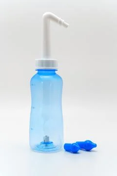 Nasal irrigator placed on a plain surface for daily use and sinus health Stock Photos