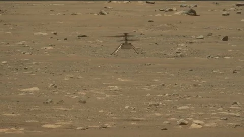 NASA's Ingenuity Mars Helicopter performs first flight from the surface of Mars Stock Footage 288979074