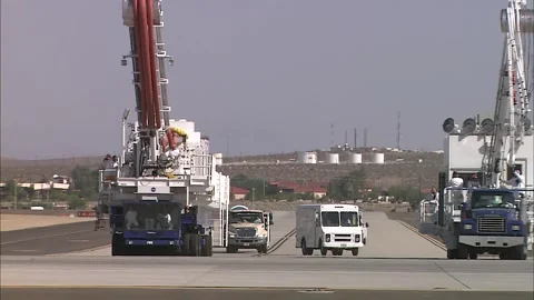 NASA's orbiter convoy deployed to the runway for Space Shuttle Atlantis STS-125 Stock Footage 283627476