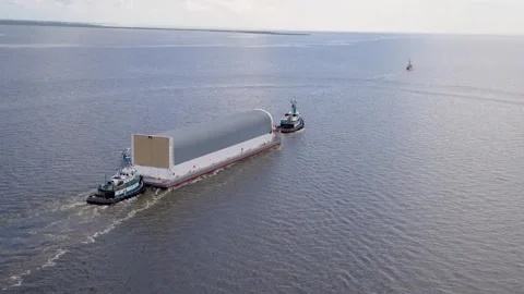 NASA's Pegasus Barge transporting Artemis II Rocket Stage through Gulf of Mexico Stock Footage 281241682