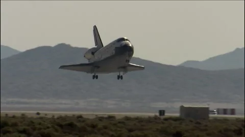 NASA's STS-125 Space Shuttle Atlantis landing at Edwards Air Force Base Stock Footage 283627506