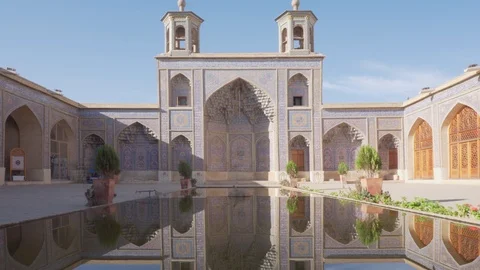 The Nasir al-Mulk Mosque reflected in pool, Shiraz, Iran Video stock 100658497