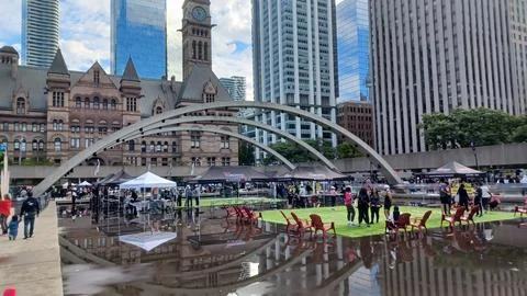 Nathan Phillips Square reflection during marathon Stock Photos