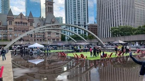 Nathan Phillips Square reflection during marathon Stock Photos