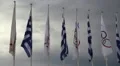 National and Olympic flags near Panathenaic Stadium in Athens, Greece HD Footage