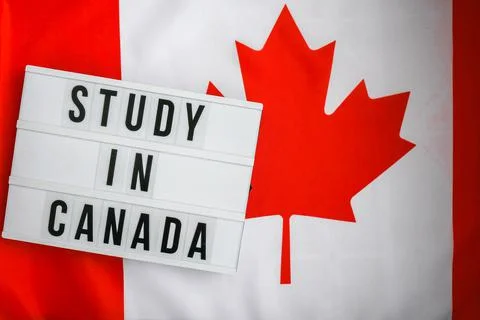 The National Flag of Canada. Lightbox with text STUDY IN CANADA Canadian Flag or 写真素材