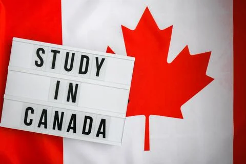 The National Flag of Canada. Lightbox with text STUDY IN CANADA Canadian Flag or Stock Photos