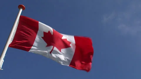National Flag of Canada, the Maple Leaf waving in blue sky 動画素材 24825874