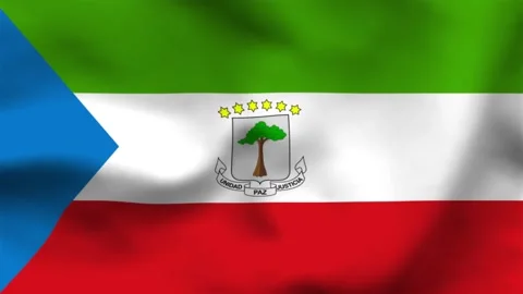 National flag of Equatorial Guinea on wavy cloth. Features a blue triangle wi 動画素材 335523760