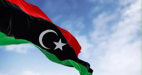 National flag of Libya waving on a clear day Stock Illustration