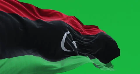 National flag of Libya waving isolated on green background Stock Footage 333867549