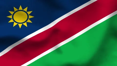 National flag of Namibia on wavy cloth. Features blue and green triangles div Stock Footage 335523836