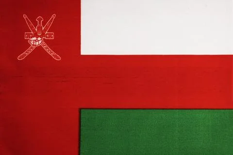 National flag of the state of Oman close-up. State background. Stock Illustration