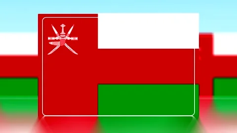 National flag of the Sultanate of Oman featuring white red and green stripe.. Video stock 343656134