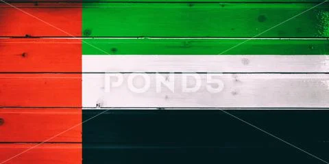 National flag of United Arab Emirates on a dull wooden background Stock Photos