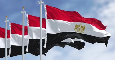 National flags of Egypt waving in the wind on a clear day Video stock 296752141