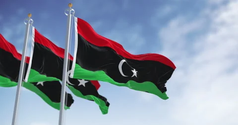 National flags of Libya waving on a clear day. Stock Footage 346759174