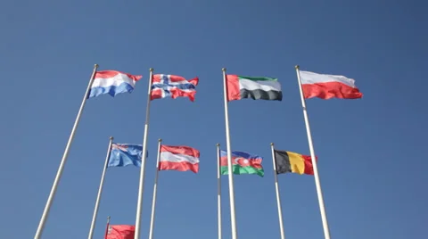 National flags of various countries  against a blue sky 库存影片 37187905