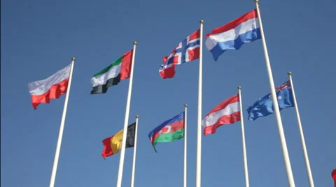 National flags of various countries  against a blue sky Vidéo 37187983