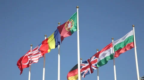 National flags of various countries  against a blue sky Stock Footage 37187994