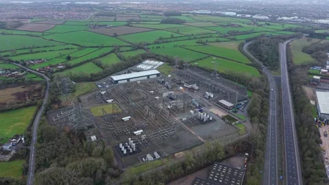 National Grid sub station, electrical energy converter transformer in UK Stock Footage 330130810