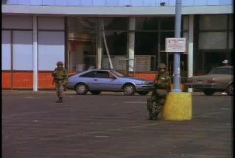 National Guard troops guard against looting during the LA Riots. Stock Footage
