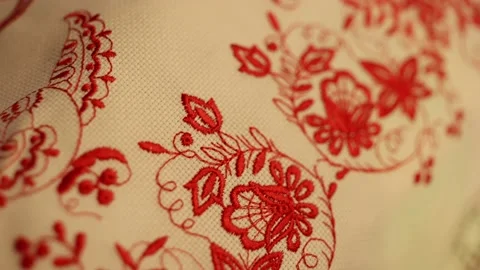 The national pattern is embroidered in red on the fabric Stock Footage 233988694